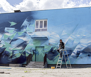 Street Artist Transforms Building Façade With Bold Strokes of Colorful Energy
