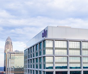 Ally Charlotte Center caps office tower with branded, custom-engineered SKYSHADE polycarbonate system by EXTECH